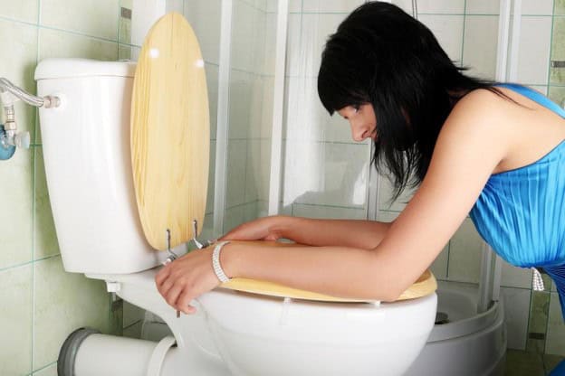Toilet cleaning with a woman in a blue dress.