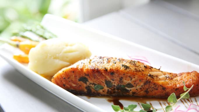 Delicious baked salmon served with creamy cauliflower puree, perfect for a healthy and easy dinner.