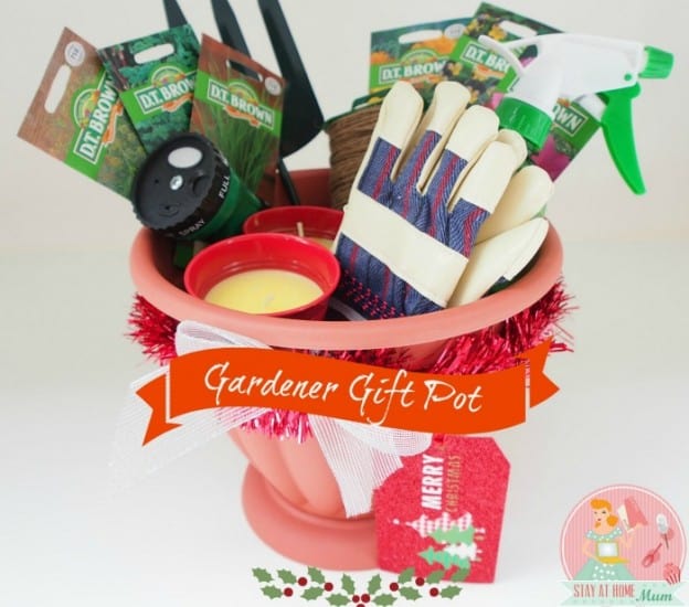 Bright gardener gift pot with gardening tools, seeds, and festive decorations for plant lovers.