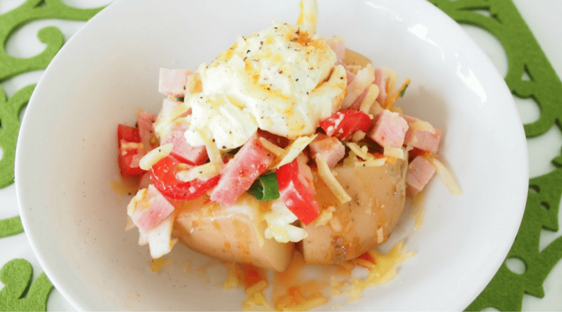 Upcycled Christmas leftover spuds with ham, cheese, and eggs for a tasty meal. Perfect for reducing.