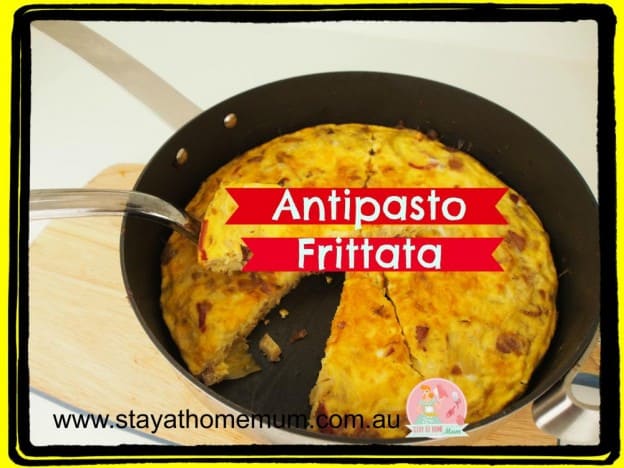 Delicious antipasto frittata cooked in a frying pan, perfect for a quick meal or brunch.
