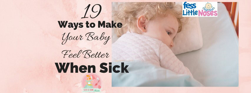 Baby lying in bed with a parent, feeling unwell, receiving care and comfort.