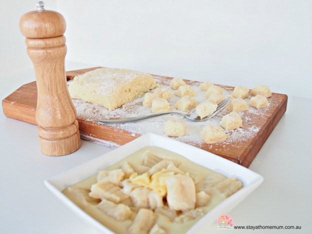 Delicious homemade gnocchi with creamy cheese sauce, perfect comfort food for family dinners.