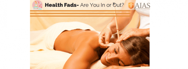 Woman receiving a massage, exploring health fads and wellness trends.