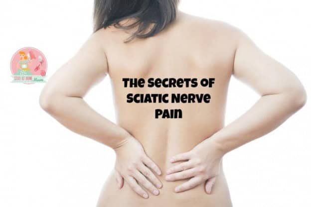 Woman holding lower back, illustrating sciatic nerve pain relief.