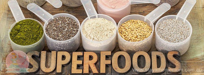 Assorted superfoods in measuring cups promoting healthy aging and longevity.