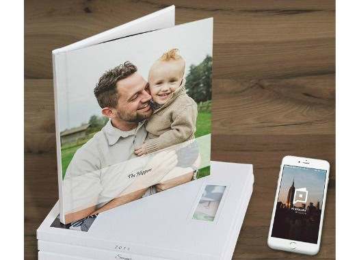 Baby photo album with a father and child, capturing first-year memories.