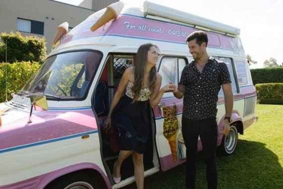 Ice cream date with a happy couple at an ice cream van, perfect for summer outings and romantic mome.
