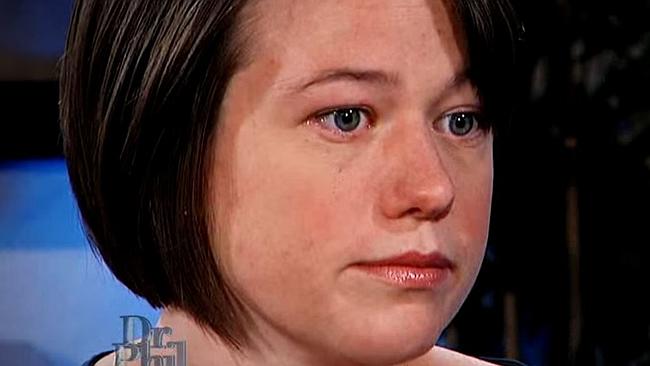 Woman with short brown hair speaks out about her traumatic childbirth experience.
