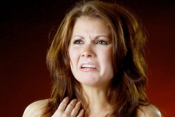 Woman with confused expression, highlighting unusual cosmetic ingredients.