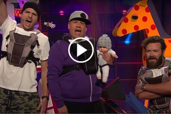 Dad Band singing about fatherhood woes and family life on stage.