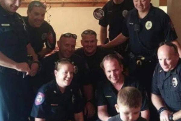 Police officers surprise young boy with autism on his third birthday, creating a memorable and joyfu.