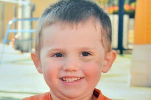 Child smiling outdoors during search for William Tyrell.