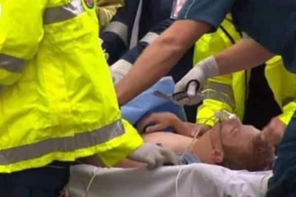 Rescue team assists teenager trapped under tree branch amid thunderstorms in Queensland.
