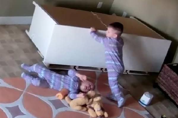 Child heroically saves sibling from falling dresser accident.