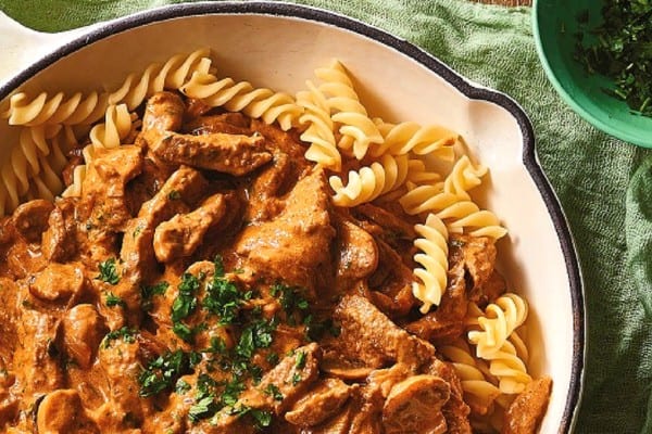 Undercover Beef Stroganoff in creamy sauce with tender beef and pasta.