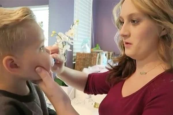 Child's teeth check-up by a dentist for early dental care.