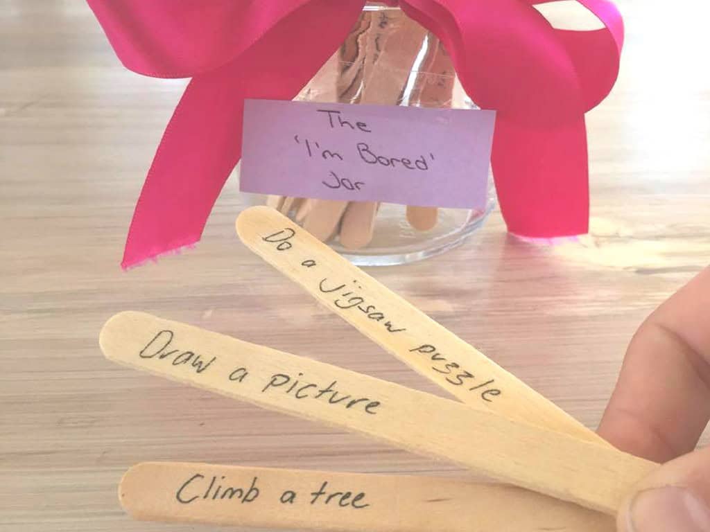 DIY 'I'm Bored' Jar with fun activity sticks for kids.