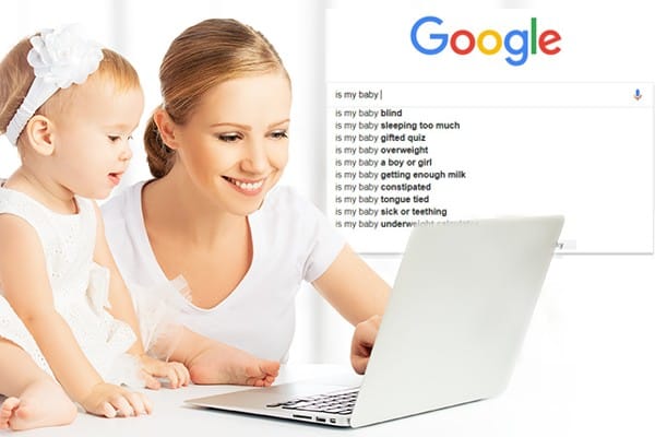 Mother and young girl using a laptop to find answers to common parenting questions.