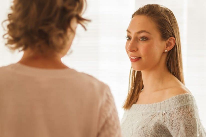 Mother and daughter discussing safety tips for Schoolies celebrations.