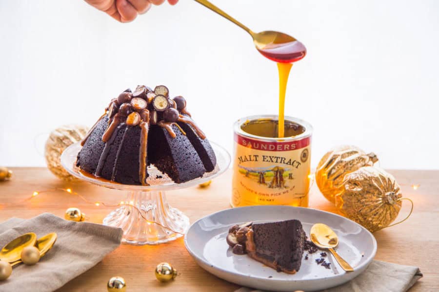 Rich steamed malt chocolate pudding with caramel sauce drizzle.