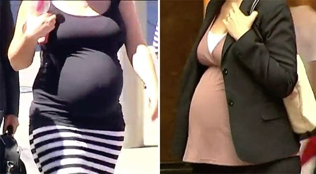 Pregnant woman in professional clothing, highlighting the importance of proper nutrition during preg.