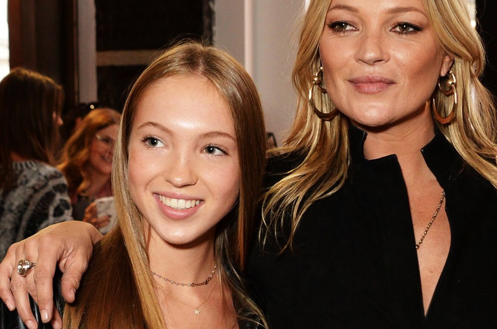 Elegant woman and girl smiling at an event, showcasing modern baby name trends for 2019.