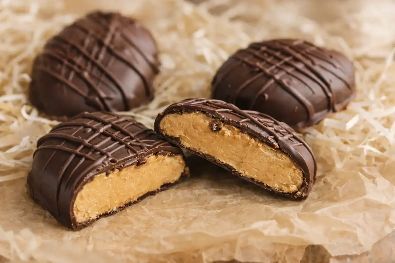 Delicious homemade peanut butter Easter eggs dipped in rich chocolate, perfect for festive celebrati.