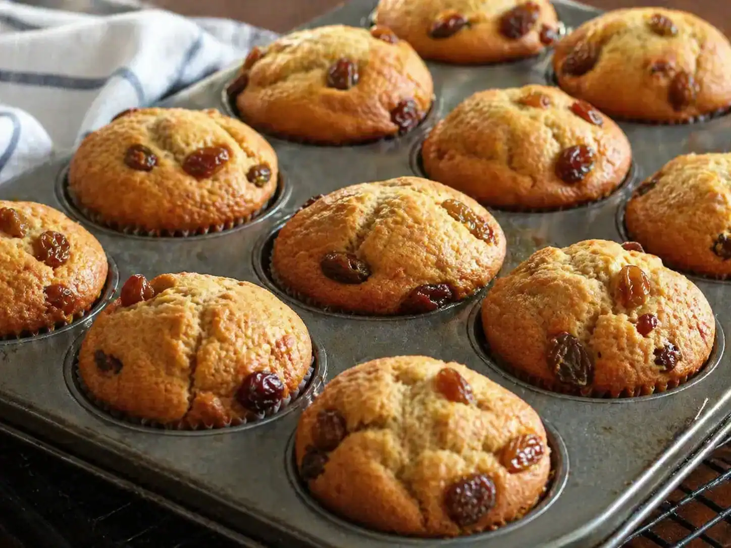 Delicious soft and fluffy sultana cinnamon muffins perfect for breakfast or snacks. Simple recipe fo.
