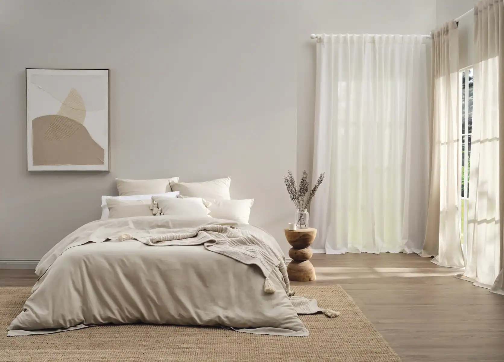 Cozy bedroom with neutral tones and natural light for a sanctuary space